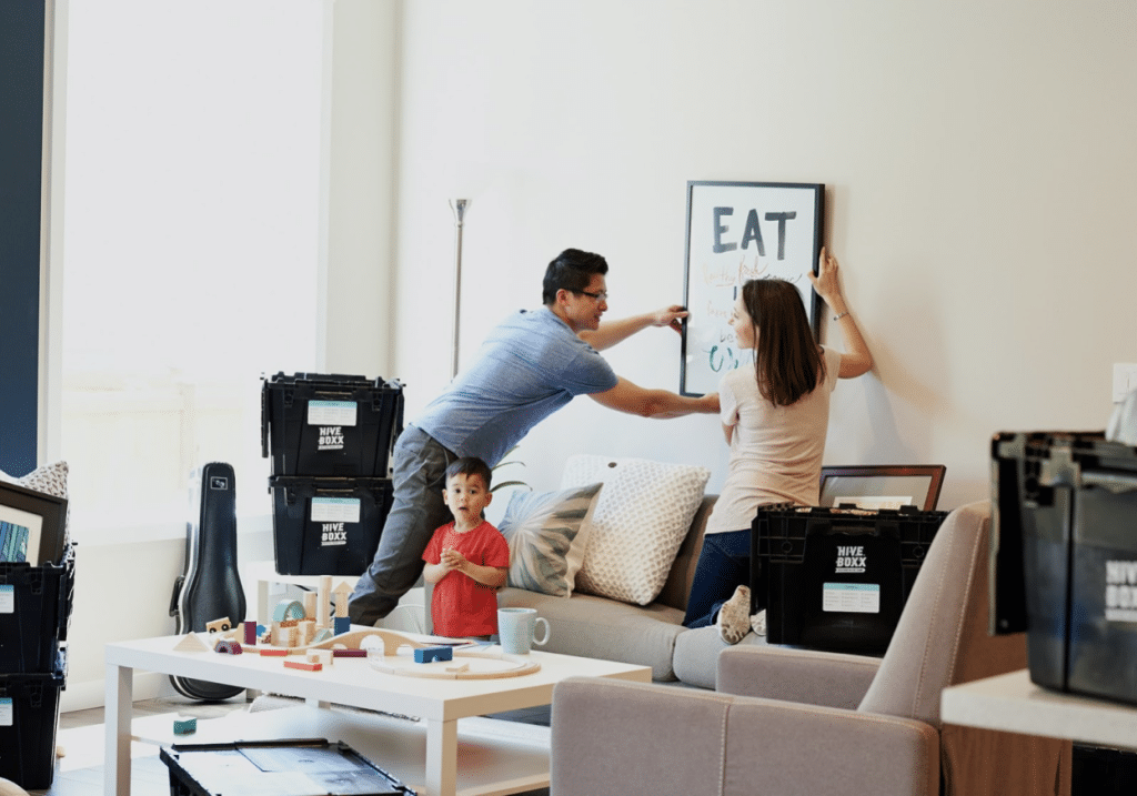 family hanging picture