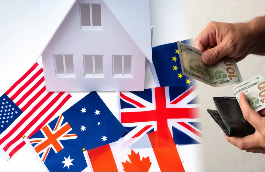 Foreign investor taxes on rental property concept with international flags, a model house, and hands paying with U.S. $100 bills